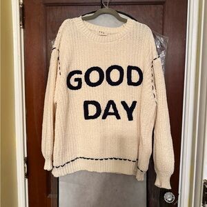 POL Cream Sweater with Black Text